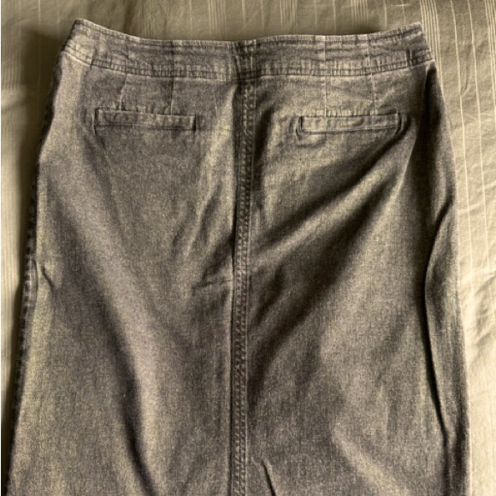 Metallic denim skirt, waist 26.5”, length 26”. Two way brass zipper.